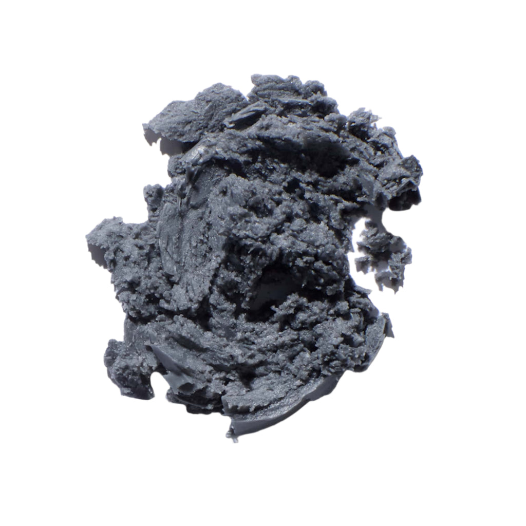 Hunter Lab Charcoal Cleansing Stick texture on a white background