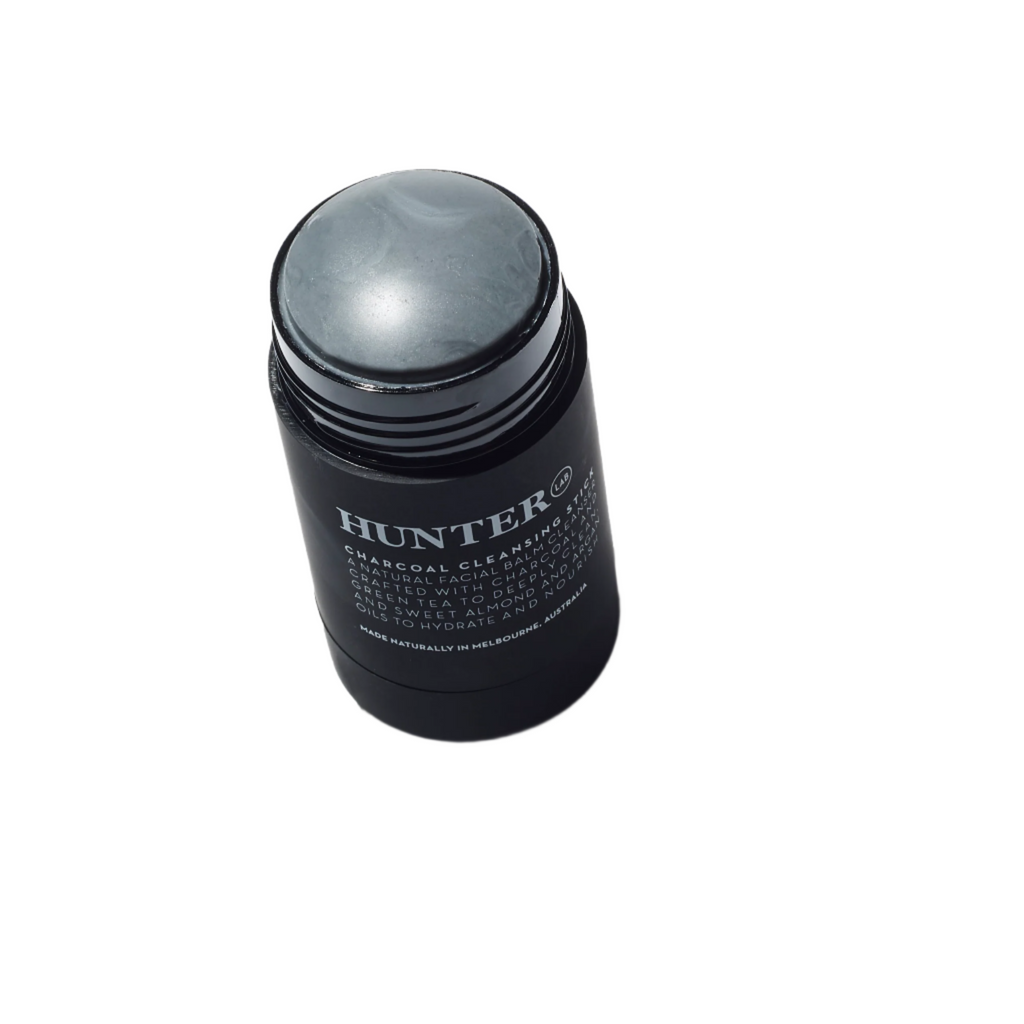 Hunter Lab Charcoal Cleansing Stick Lid Off showing product on a white background