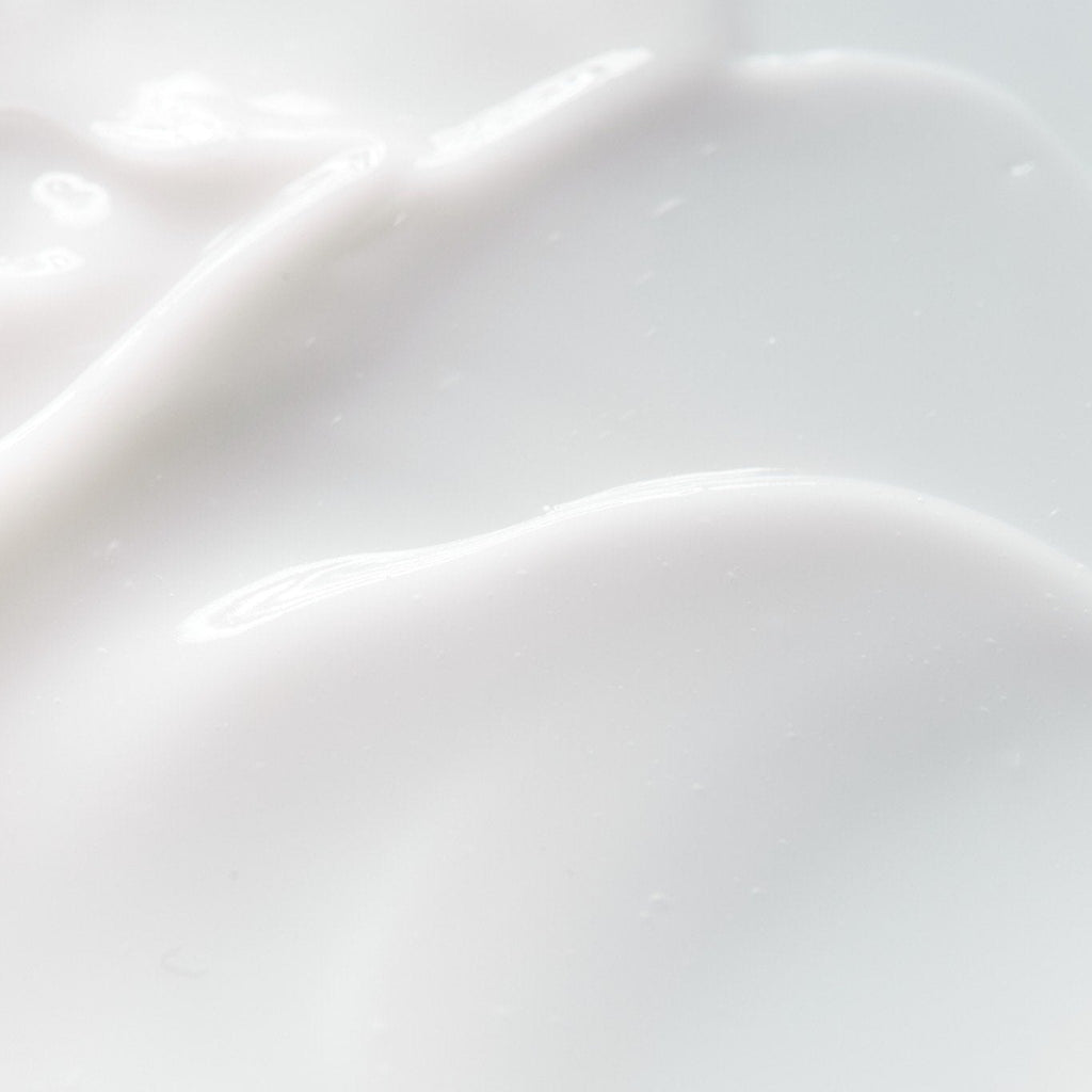 Texture of LESSE Awakening Eye Cream – lightweight, silky cream with prickly pear and Reparative Baobab to brighten, reduce puffiness, firm, and awaken the eyes - Gllosse